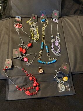 Lot of paparazzi jewelry as shown.  Necklace sets/ bracelet/ ring
